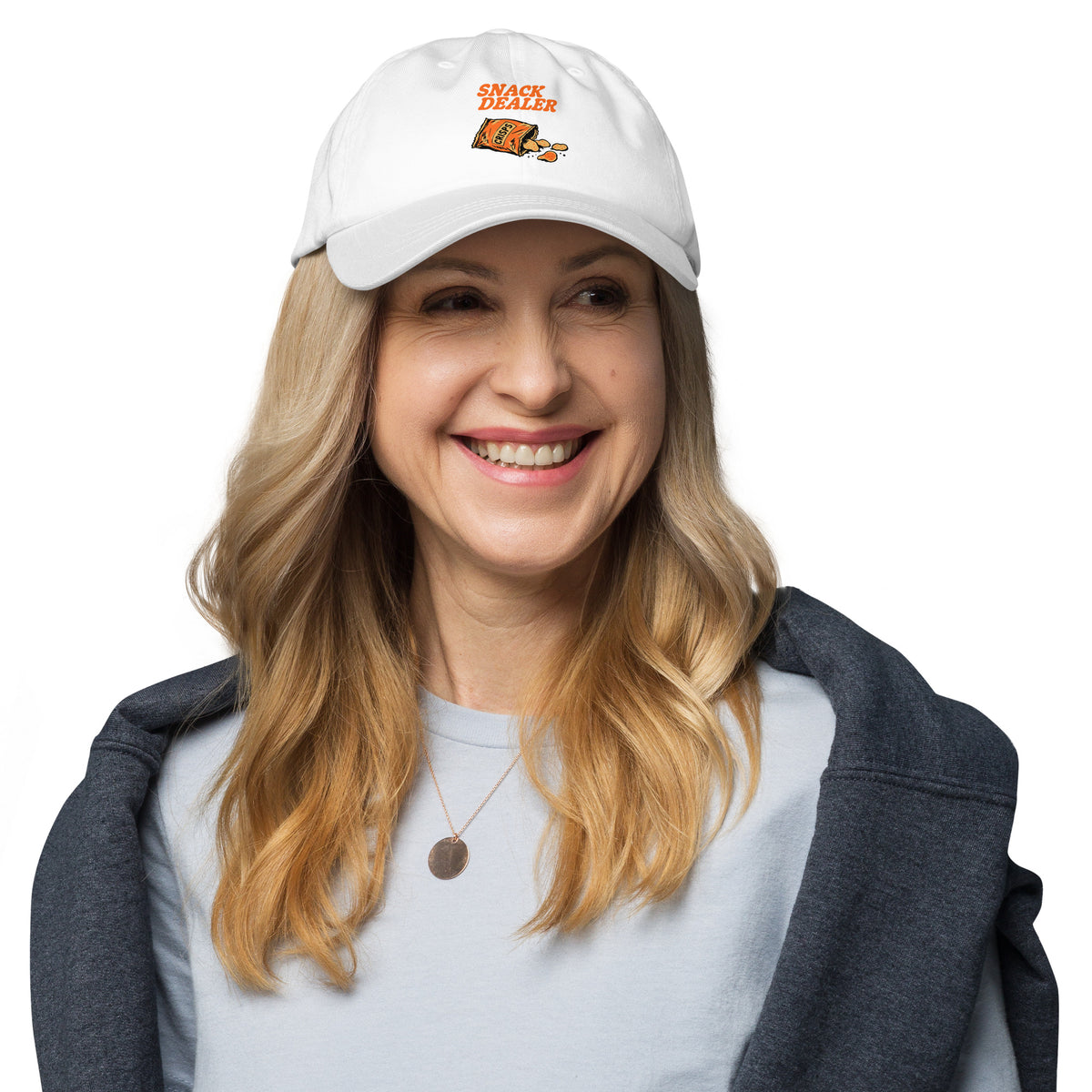 The Snack Dealer Dad Hat combines classic casual style with a fun twist. Made from soft, durable cotton, it features an adjustable strap for a perfect fit. The playful "Snack Dealer" graphic adds a lighthearted touch, making it ideal for outings or lounging at home. Pair it with your favorite tee for a laid-back look that showcases your love for snacks and style!