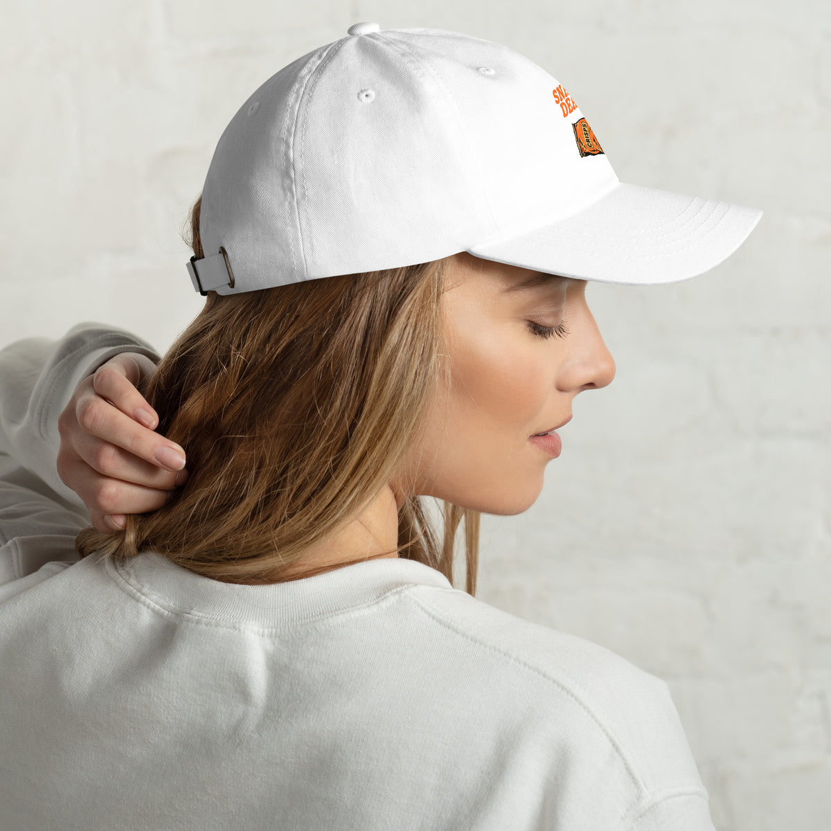 Shop the Snack Dealer Dad Hat with Classic Casual Style for a relaxed, versatile accessory that adds personality to any outfit.