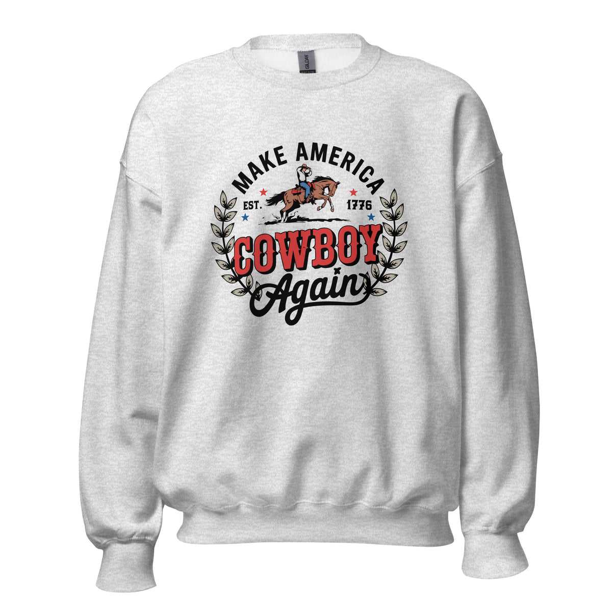 A light heather gray crewneck sweatshirt featuring a vintage-style graphic on the chest with the text 'MAKE AMERICA COWBOY Again' in black and red, flanked by a cowboy on a horse and leafy branches.