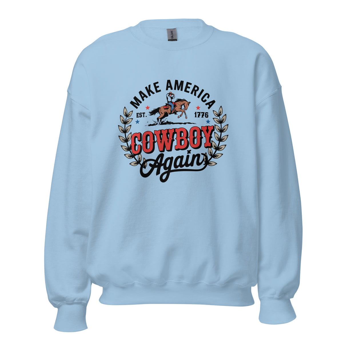 A light blue crewneck sweatshirt featuring a vintage-style graphic on the chest that reads 'MAKE AMERICA COWBOY Again' with a cowboy riding a horse and leafy branches.