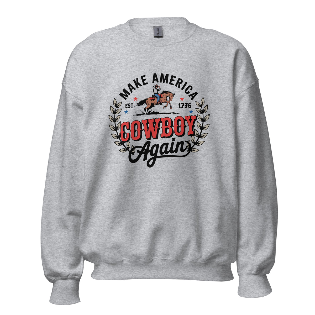 A light heather gray crewneck sweatshirt featuring a vintage-style graphic on the chest with the text 'MAKE AMERICA COWBOY Again' in black and red, flanked by a cowboy on a horse and leafy branches.