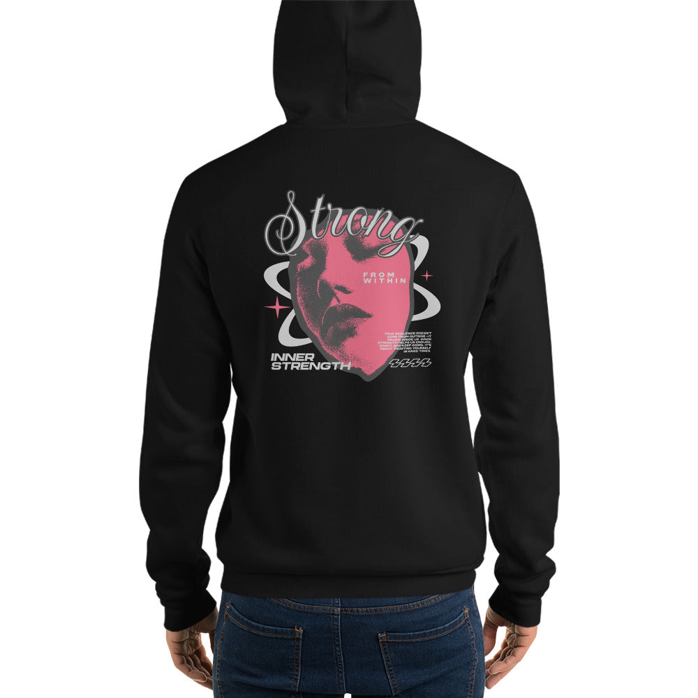 A person shown from the back wearing a black hoodie with a large pink, white, and gray graphic on the back, paired with blue jeans, against a plain white background.