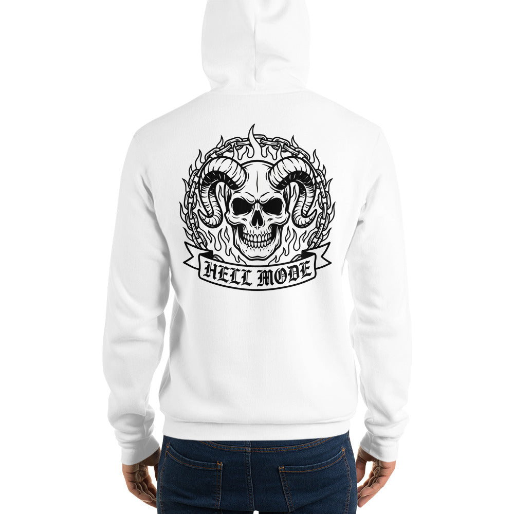 A white hooded sweatshirt shown from the back on a model, featuring a large black graphic of a skull with curved horns, flames, and a banner reading 'HELL MODE'.
