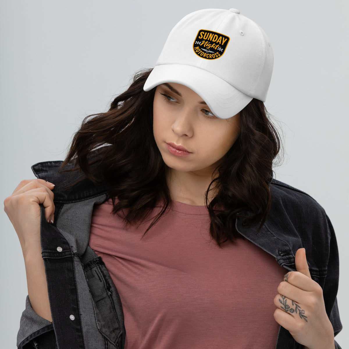 The Timeless Sunday Night Motocross Baseball Cap combines classic style with motorsport flair. Crafted from durable materials, it features a sleek design accented by vibrant stitching and an adjustable strap for the perfect fit. Whether you’re hitting the track or enjoying a casual day out, this cap is a must-have accessory for motorsport enthusiasts. Elevate your look with this versatile piece that celebrates the thrill of motocross.