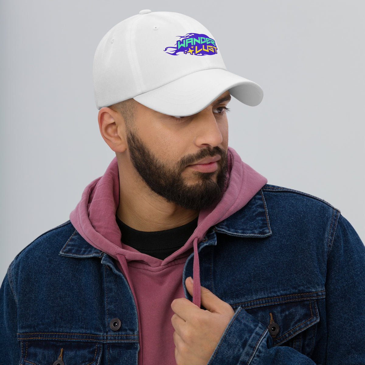 Elevate your casual look with the Wanderlust Typography Lettering Classic Dad Hat, designed for everyday wear and wanderers.