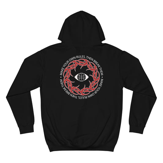 A black pullover hoodie shown from the back, featuring a circular graphic print with red flames, a white globe, and white text reading 'MAKE YOUR OWN RULES, THEN BREAK THEM.' on a plain white background.