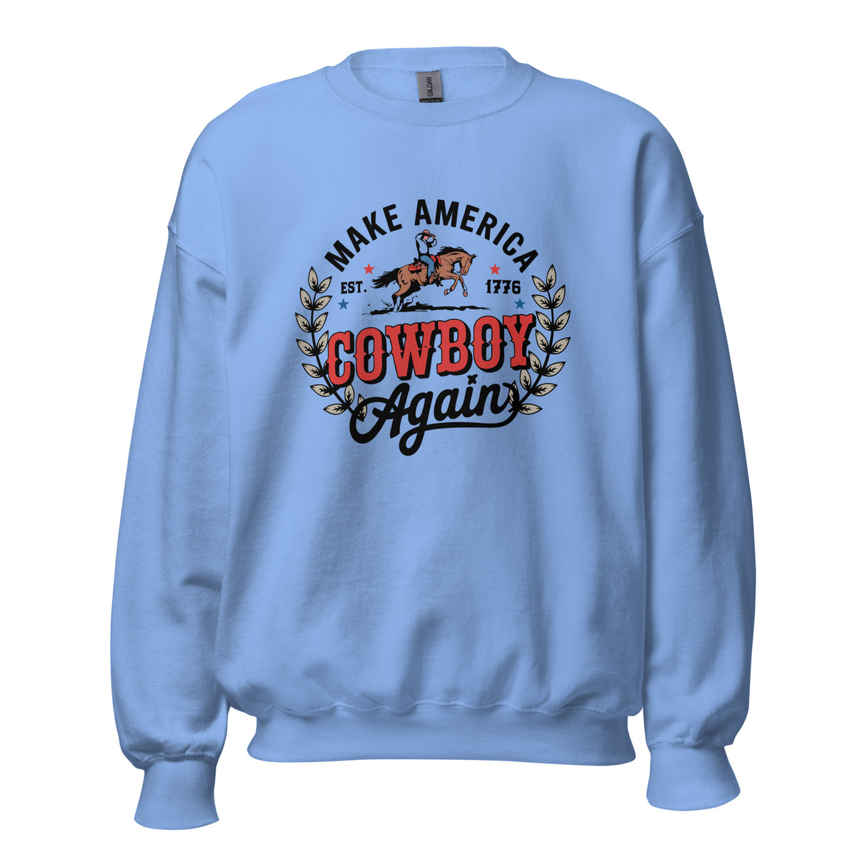 A light blue crewneck sweatshirt featuring a vintage-style graphic on the chest that reads 'MAKE AMERICA COWBOY Again' with a cowboy riding a horse and a laurel wreath.