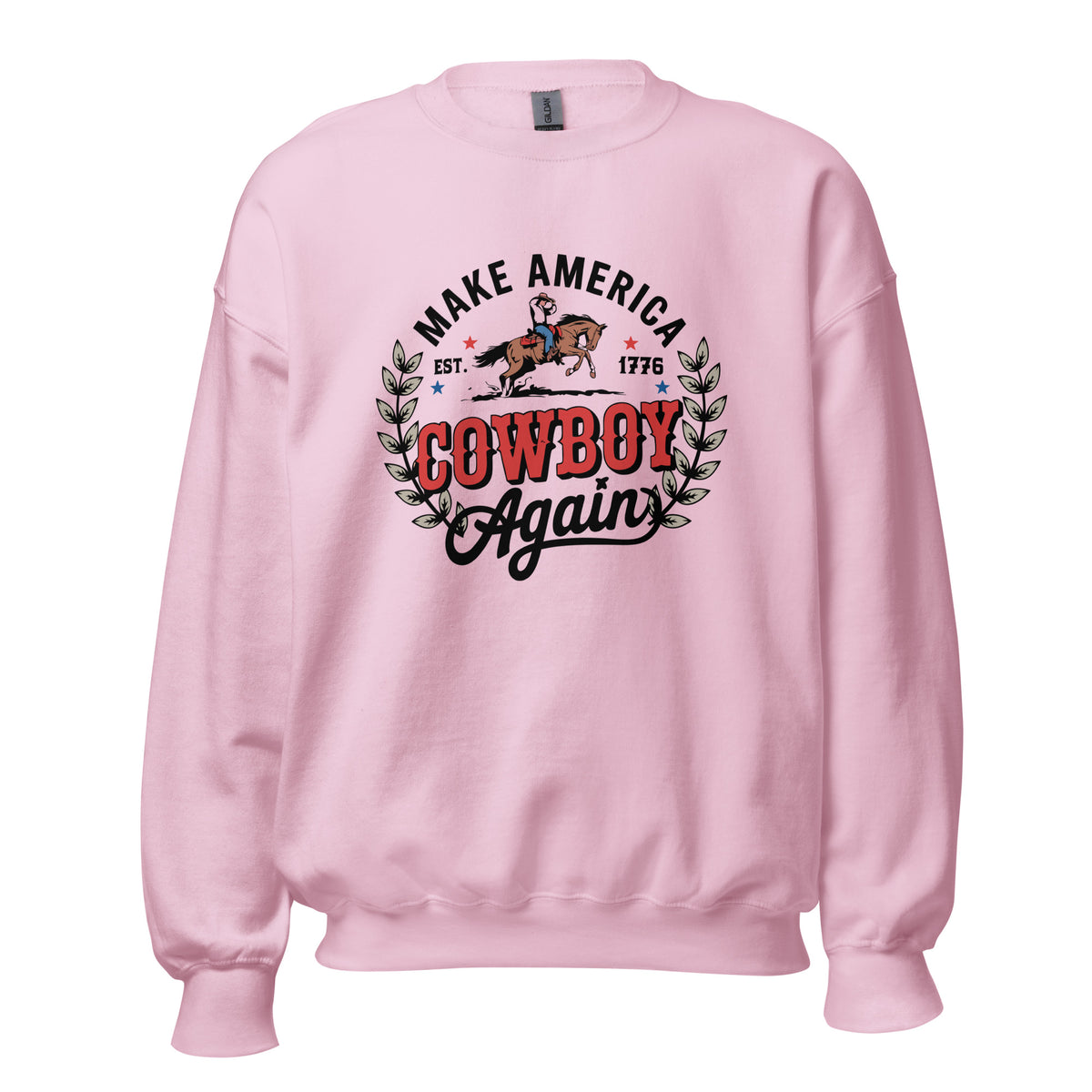 A light pink crewneck sweatshirt featuring a western-themed graphic on the chest that reads 'MAKE AMERICA COWBOY Again' with an illustration of a cowboy on a horse and the year '1776'.