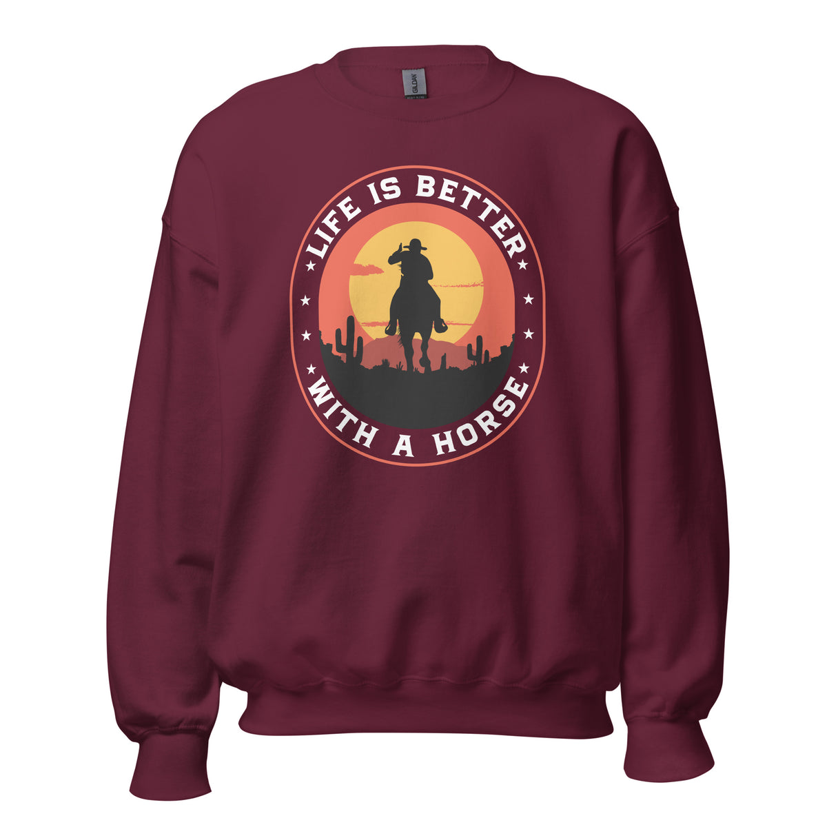 A maroon crewneck sweatshirt featuring a circular western-themed graphic on the chest with a cowboy silhouette, cacti, and the text 'LIFE IS BETTER WITH A HORSE' in white over a yellow and orange sunset.