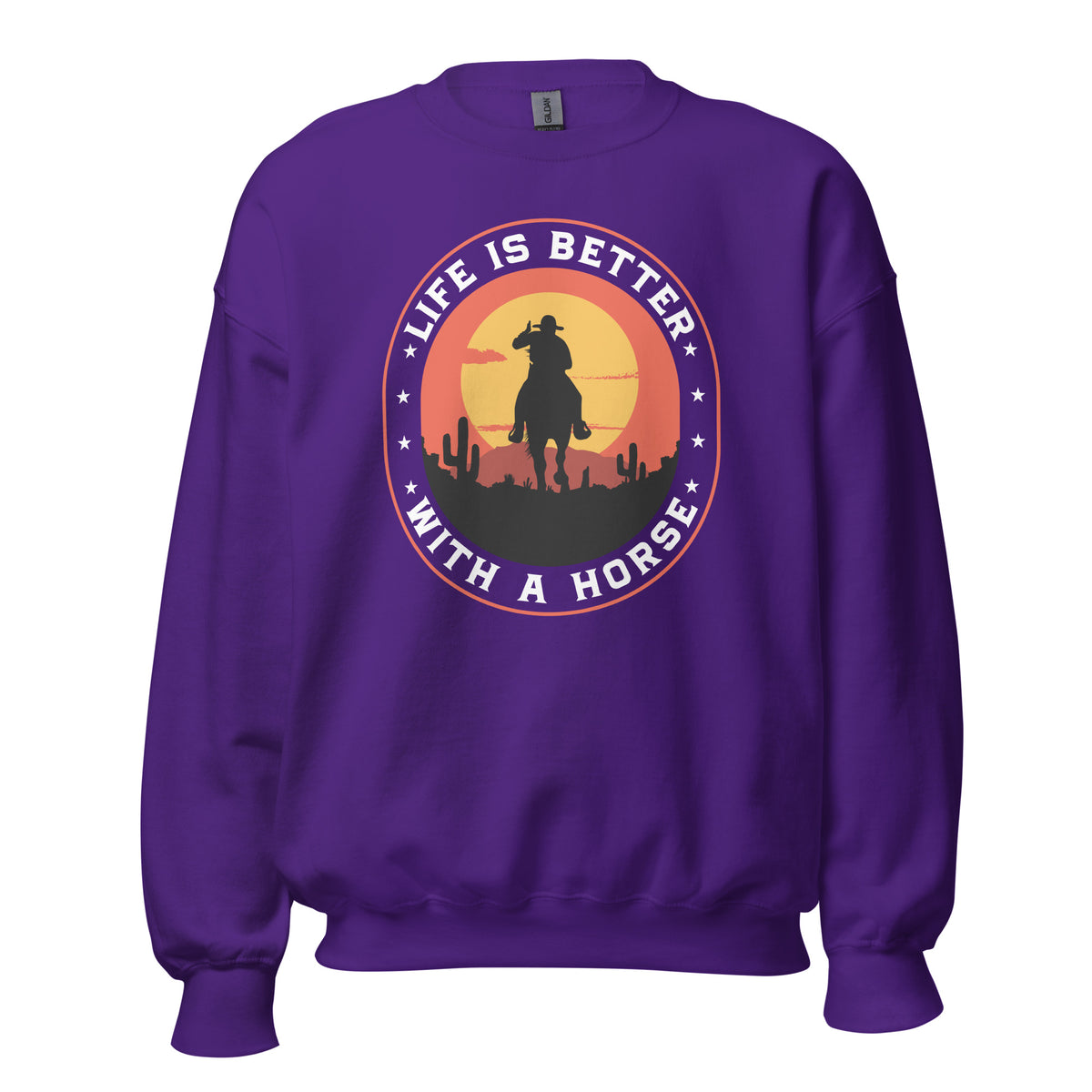 A purple crewneck sweatshirt featuring a circular graphic on the chest with a cowboy silhouette riding a horse against a sunset, with the text 'LIFE IS BETTER WITH A HORSE' in white.