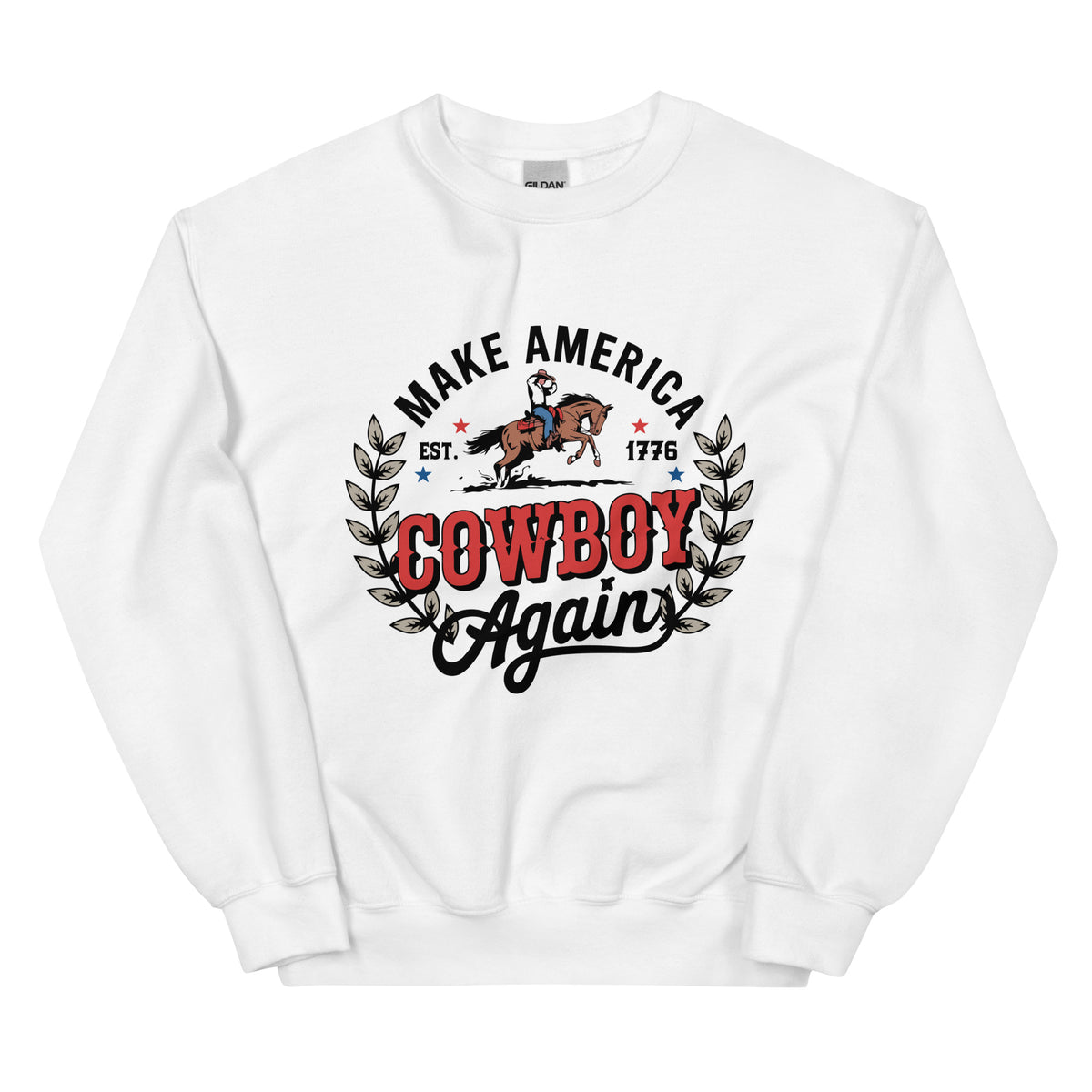A white crewneck sweatshirt featuring a graphic print on the front with the text 'MAKE AMERICA COWBOY Again' in black and red, flanked by a cowboy on a bucking horse and leafy wreaths.