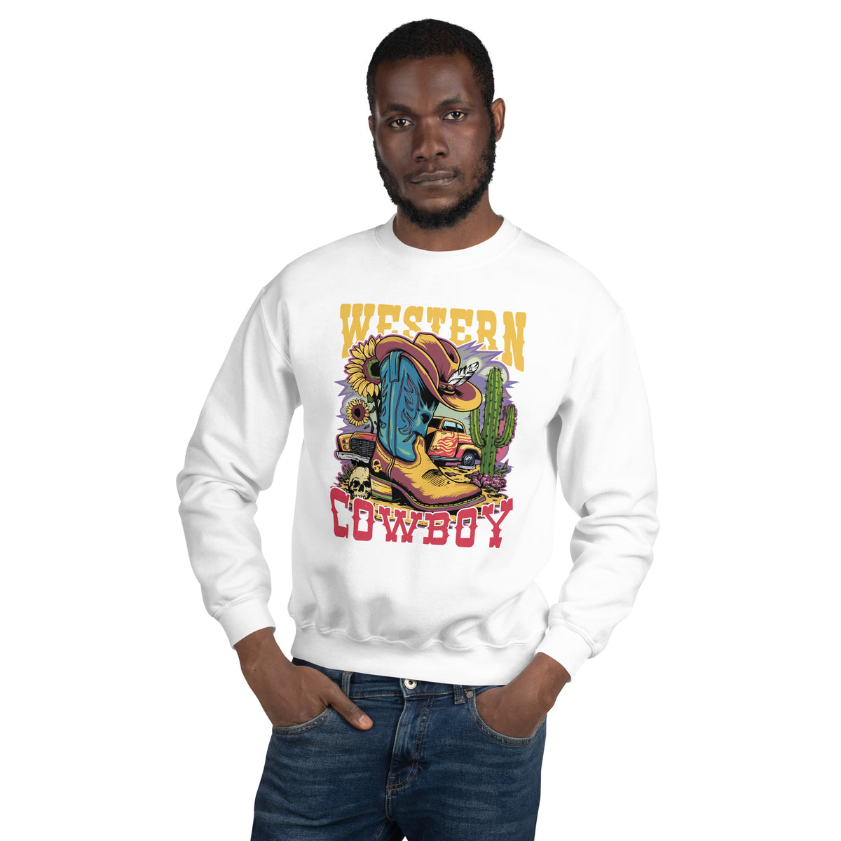 A man wearing a white crewneck sweatshirt with a colorful 'Western Cowboy' graphic print, paired with blue jeans, against a plain white background.