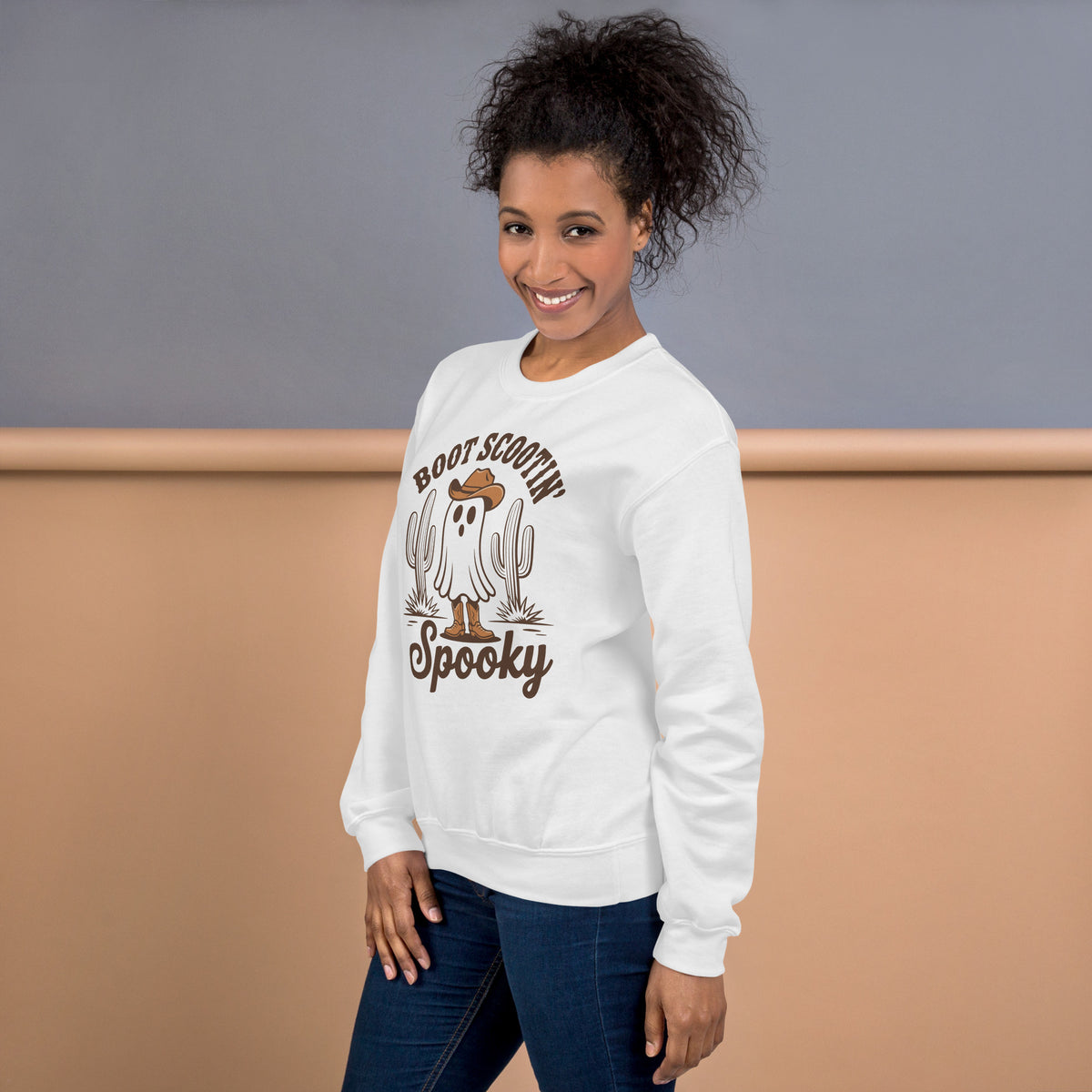 Shop Best Boot Scootin’ Spooky Western Halloween Sweatshirt Festive Wear for a playful western twist on cozy fall fashion, perfect for spooky season.