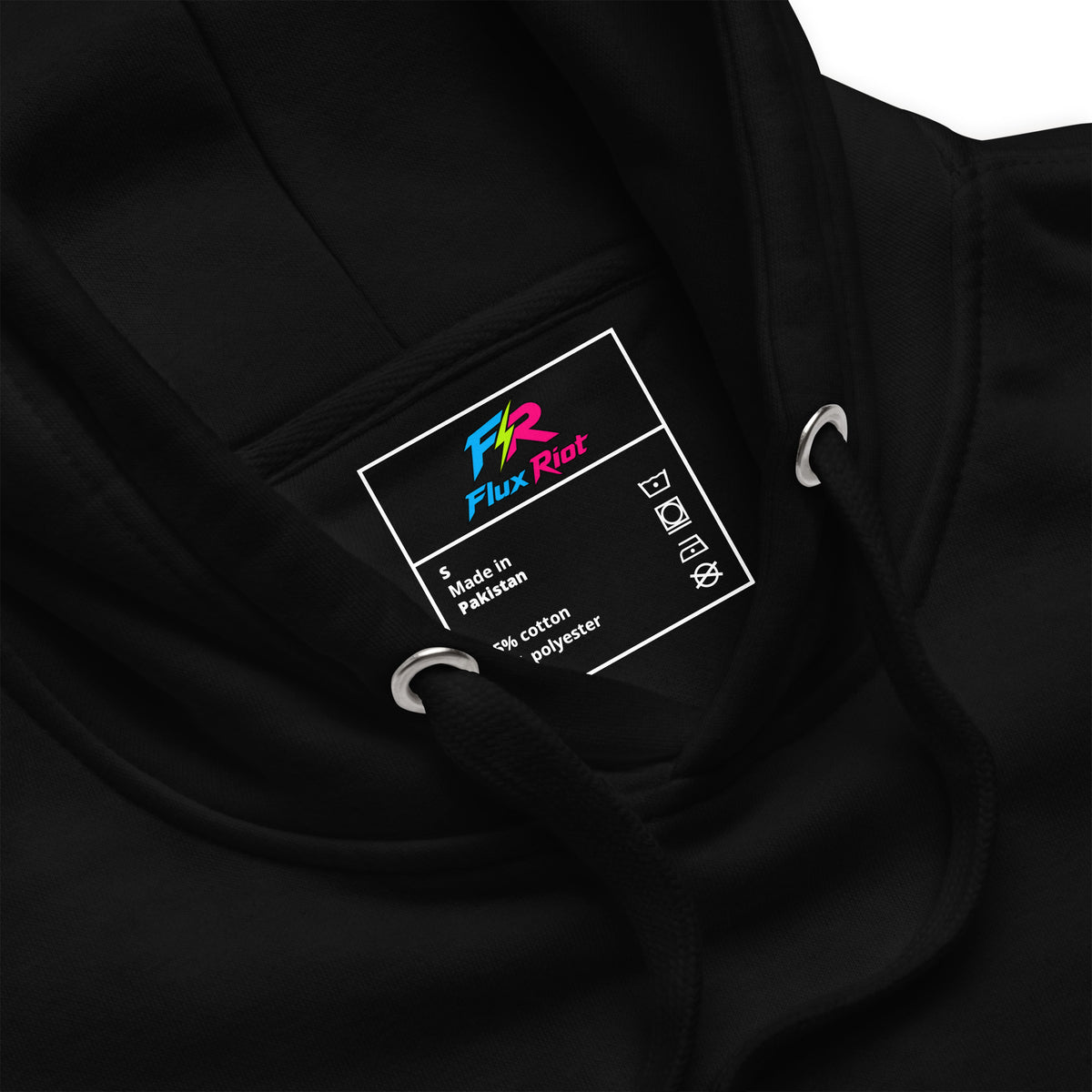 Close-up of a black hoodie showing the inner neck label with the Flux Riot logo and silver drawstring rings.