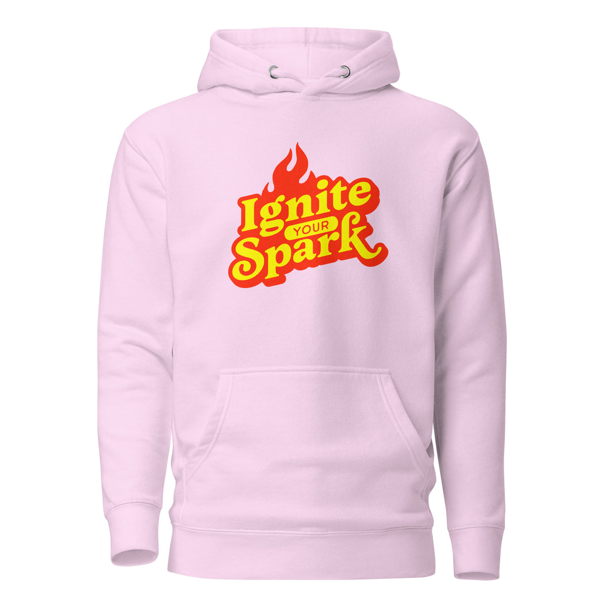 A light pink pullover hoodie with a front kangaroo pocket and a graphic on the chest that reads 'Ignite Your Spark' in yellow and red with a flame icon, shown on a plain white background.
