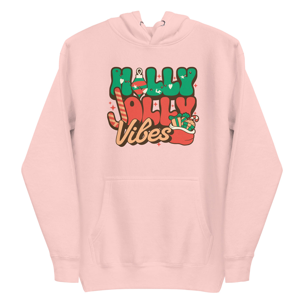 A light pink pullover hoodie with a festive graphic on the chest that reads 'Holly Jolly Vibes' in green, red, and brown retro lettering with holiday illustrations.