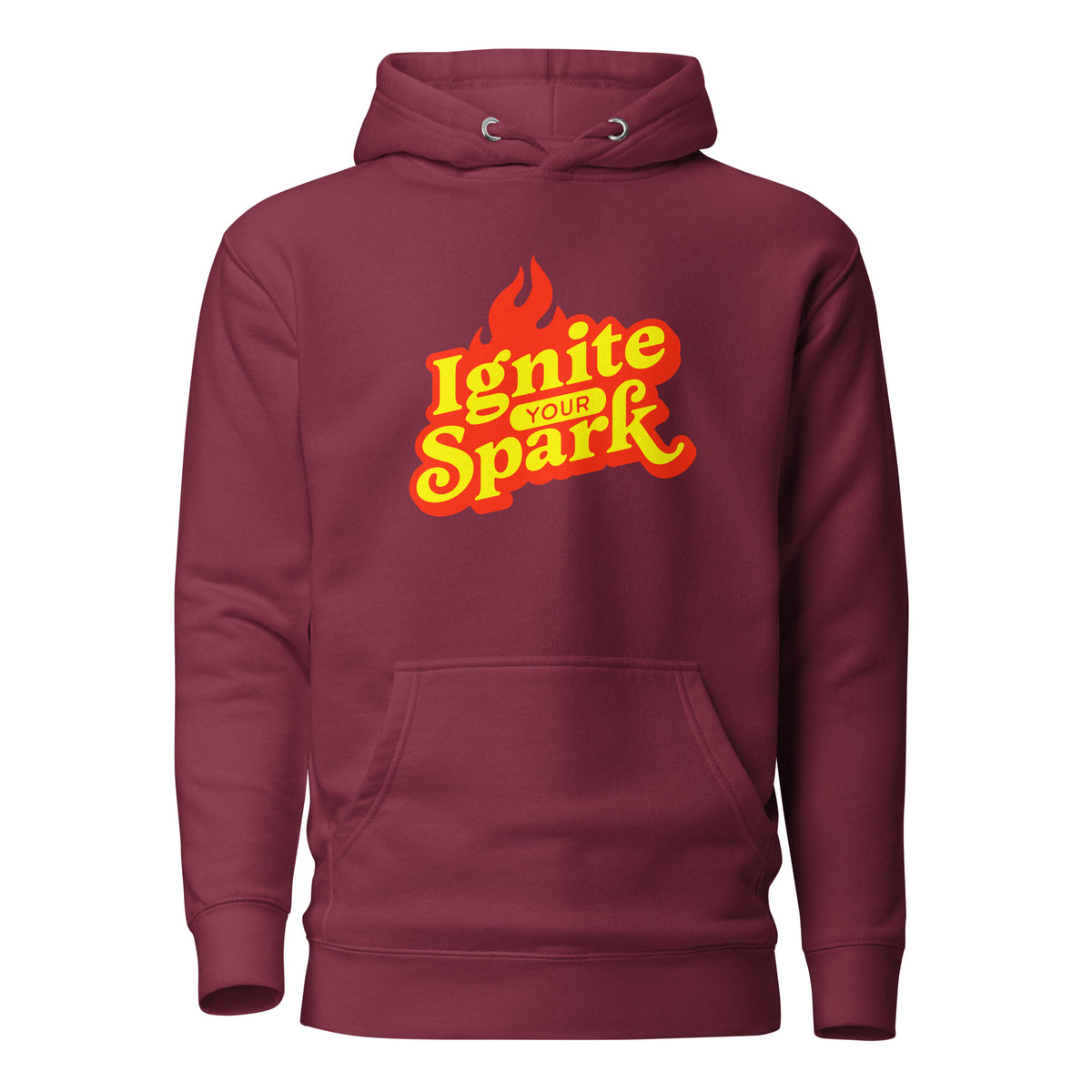 A maroon pullover hoodie with a front kangaroo pocket and a graphic on the chest that reads 'Ignite Your Spark' in yellow and orange lettering with a flame icon, shown on a plain white background.