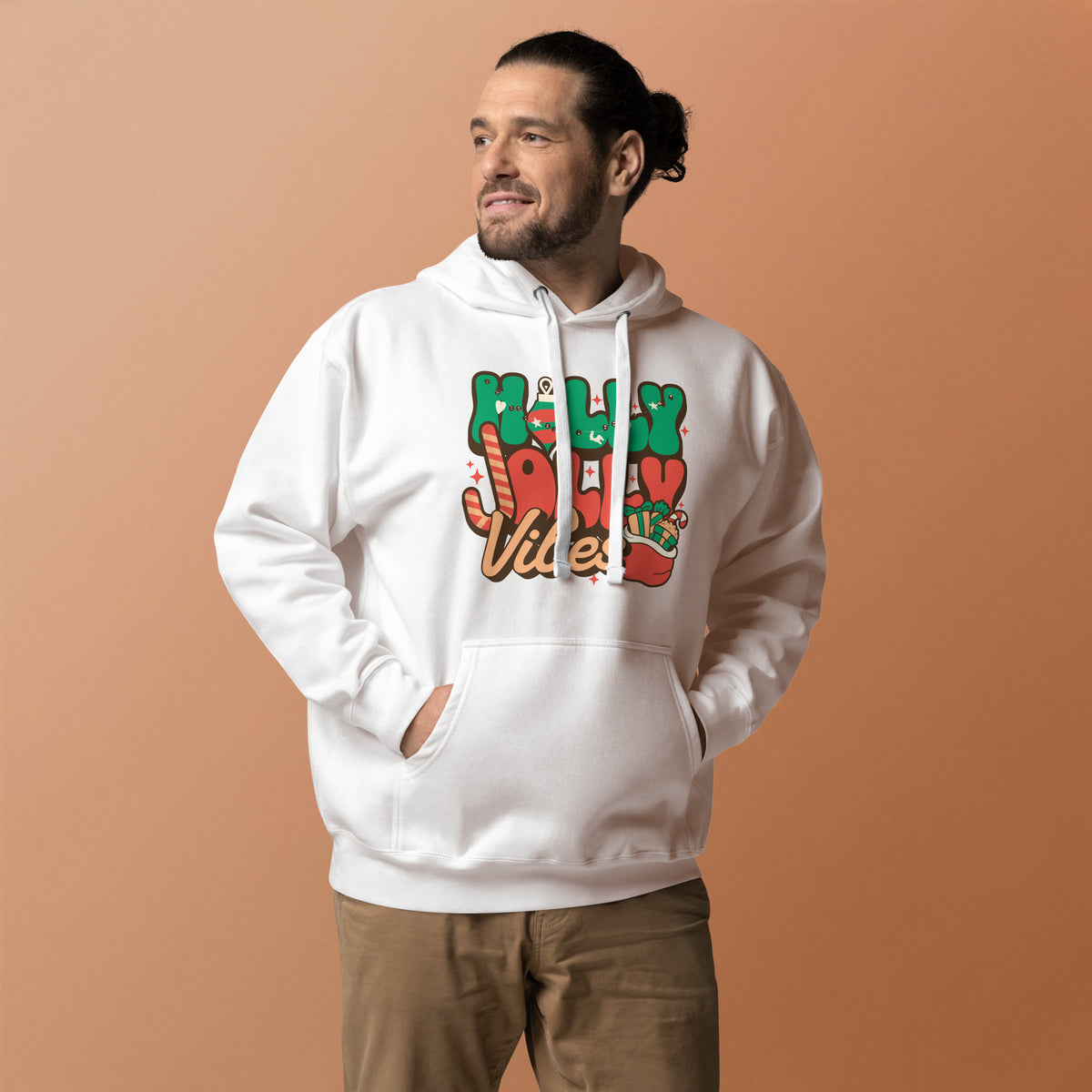 Spread festive cheer in a Holly Jolly Vibes Christmas Graphic Hoodie, featuring cozy comfort and playful seasonal style for winter days.