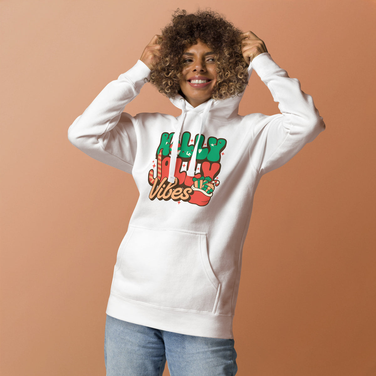 Shop the Holly Jolly Vibes Christmas Graphic Hoodie for a cozy, cheerful layer that brings standout seasonal style to every holiday gathering.