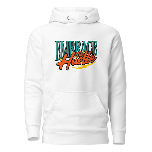 A white pullover hoodie with a front kangaroo pocket and a graphic print on the chest reading 'EMBRACE the Hustle' in teal and orange lettering with a yellow swoosh, shown on a plain white background.