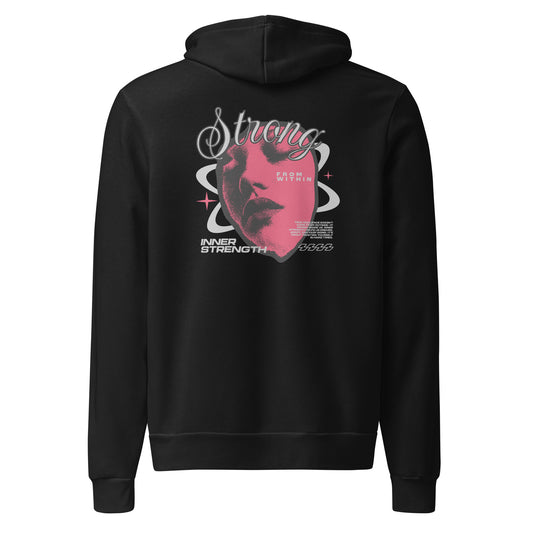 A black pullover hoodie shown from the back, featuring a large graphic print with a pink face silhouette, white script text reading 'Strong', and smaller white text and decorative elements.