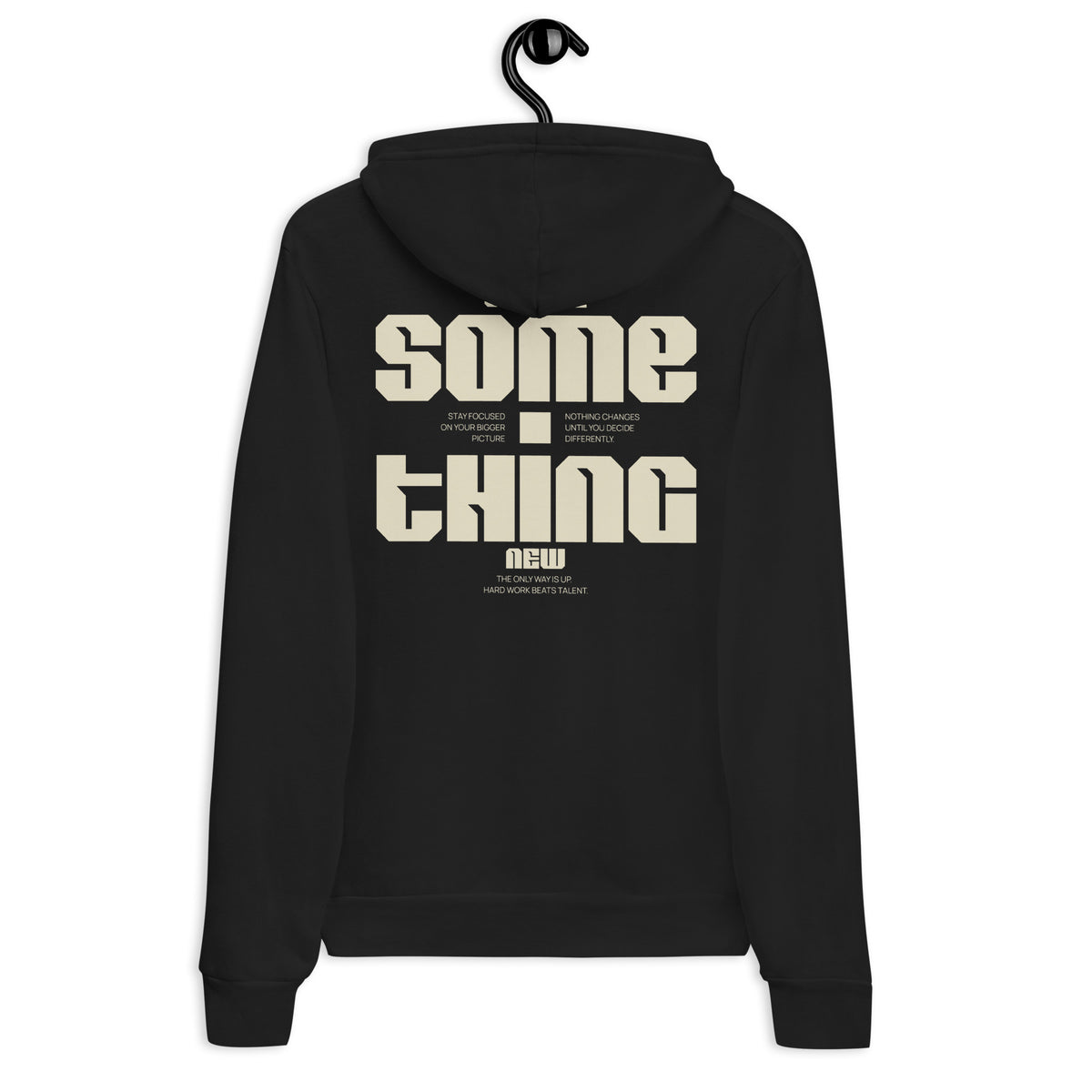A black pullover hoodie hanging on a black hanger against a plain white background, showing the back view with a large beige graphic text print that reads 'some thing new'.
