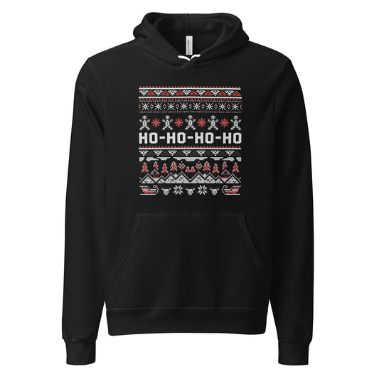 A black pullover hoodie featuring a festive Christmas-themed graphic print on the chest with the text 'HO-HO-HO-HO' and holiday patterns in red, white, and gray.