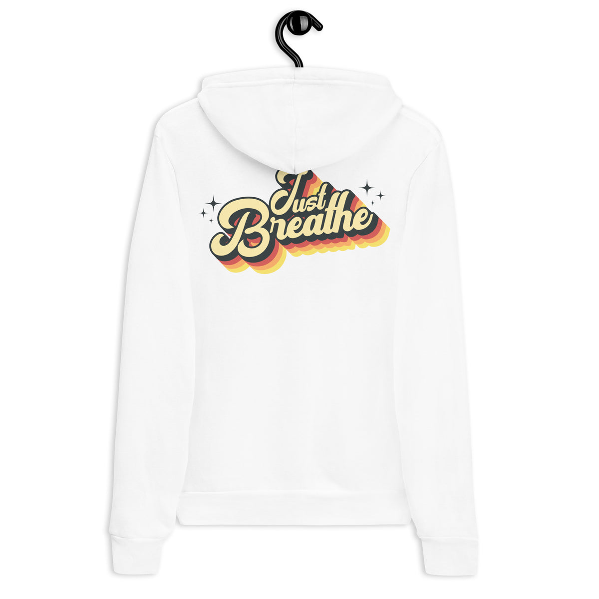 A white pullover hoodie shown from the back, hanging on a black hanger against a plain white background. The back features a retro-style graphic with the words 'Just Breathe' in yellow and orange lettering with a red and yellow shadow effect.